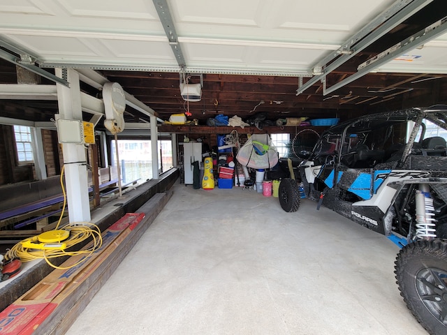 garage featuring a garage door opener