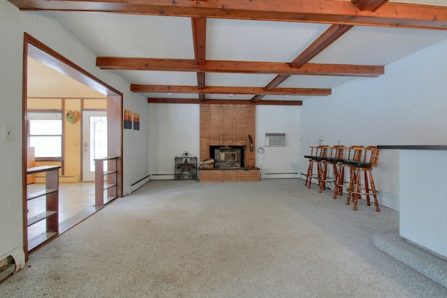 carpeted living room with beamed ceiling, a wood stove, baseboard heating, and a wall unit AC