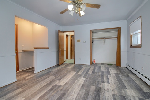 unfurnished bedroom featuring ceiling fan, wood-type flooring, a baseboard radiator, and ornamental molding