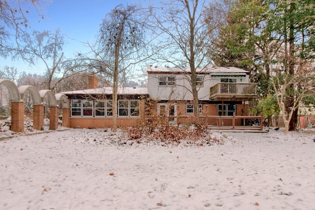 view of snow covered property