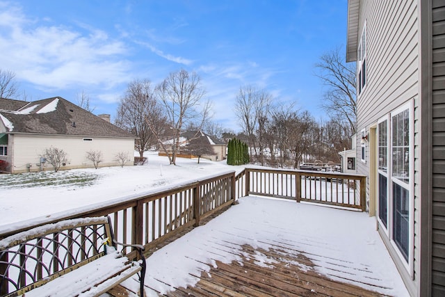 view of snow covered deck