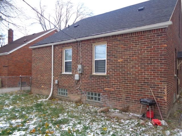 view of snow covered property