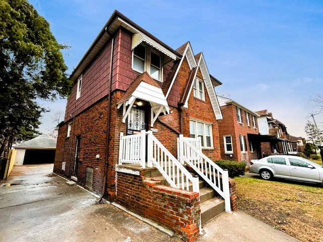 view of front of house with an outbuilding and a garage