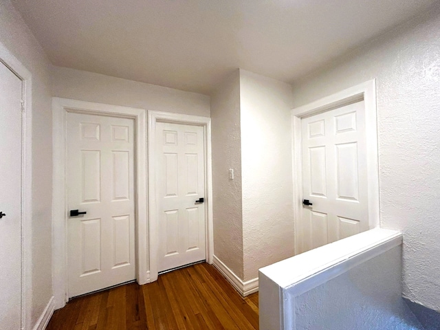 hall featuring dark hardwood / wood-style floors