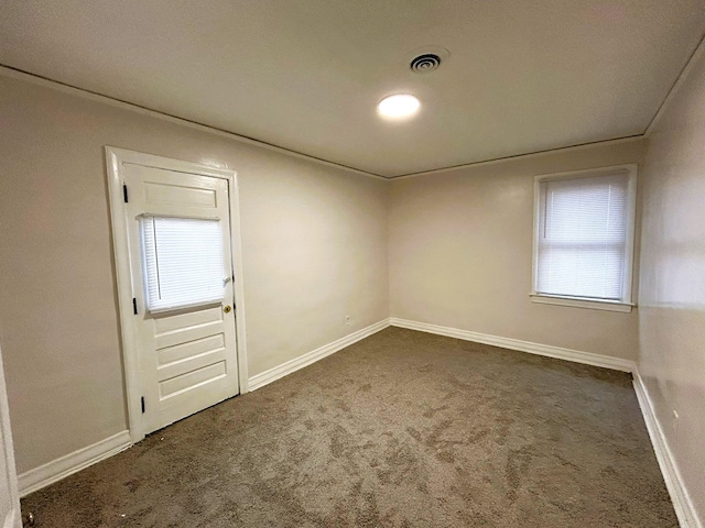 view of carpeted spare room