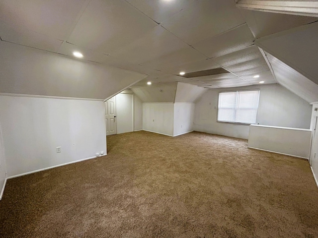 bonus room featuring carpet flooring, vaulted ceiling, and recessed lighting