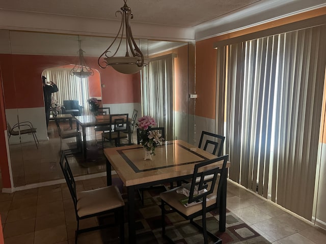 dining area featuring tile patterned flooring