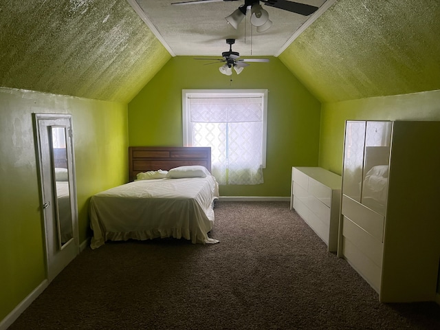 bedroom with carpet flooring, ceiling fan, a textured ceiling, and vaulted ceiling