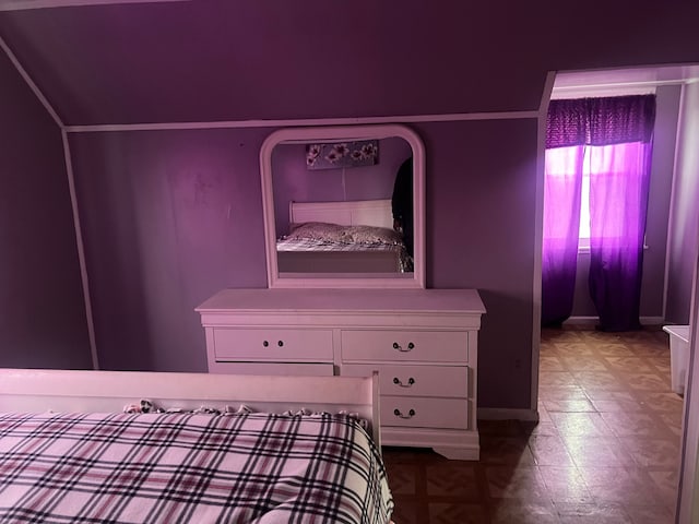 unfurnished bedroom with ornamental molding