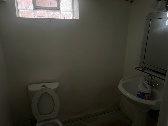 bathroom with toilet and sink