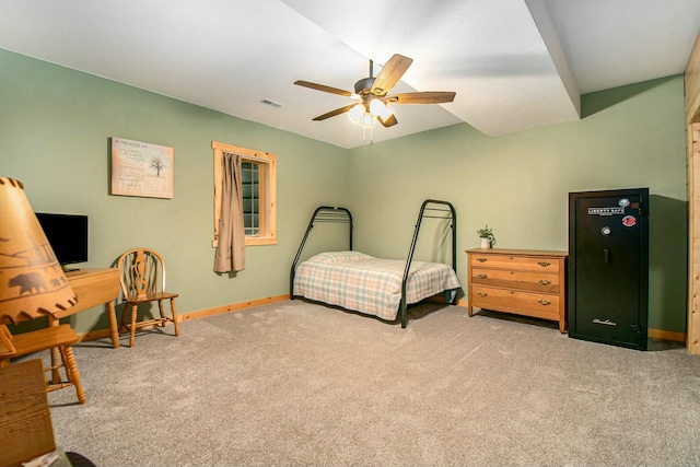 bedroom with ceiling fan and light carpet