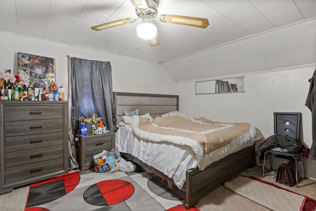 carpeted bedroom with ceiling fan and lofted ceiling