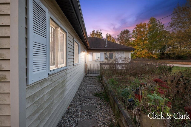 view of property exterior at dusk