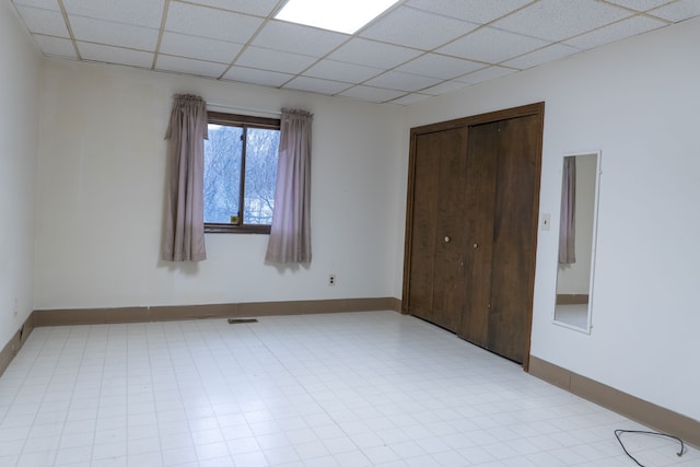 5620 Kaufman St, Dearborn Heights, MI 48125 - unfurnished room featuring a drop ceiling, baseboards, and light flooring