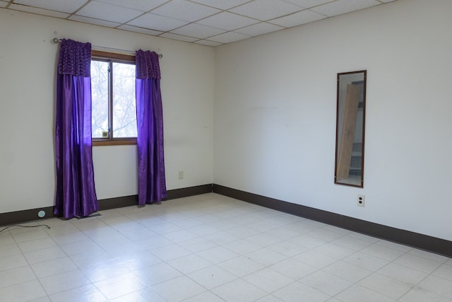 5620 Kaufman St, Dearborn Heights, MI 48125 - spare room featuring a drop ceiling and baseboards