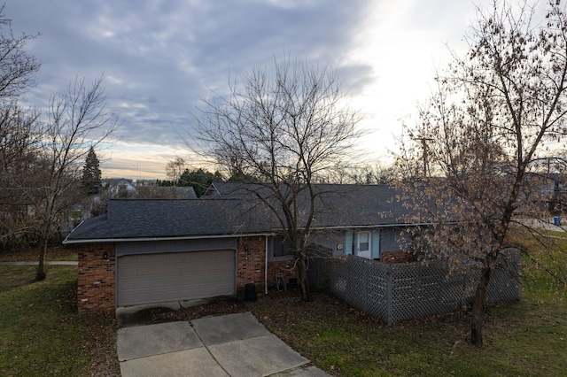 single story home featuring a garage