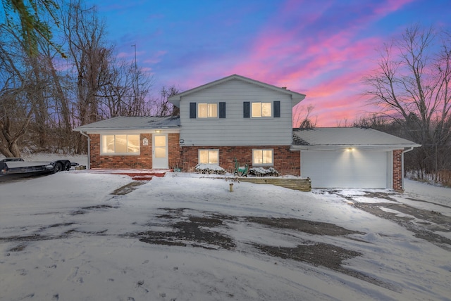 split level home with a garage