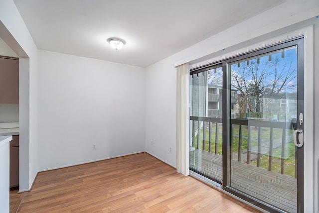 unfurnished dining area featuring light hardwood / wood-style floors