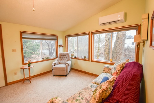 sunroom with a healthy amount of sunlight, lofted ceiling, and a wall mounted AC