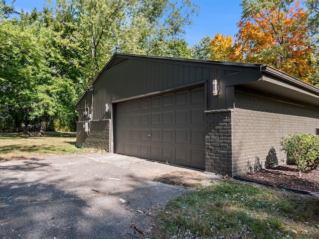 view of side of property featuring a garage