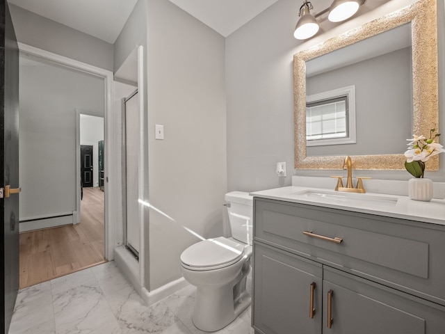 bathroom featuring vanity, a baseboard heating unit, hardwood / wood-style flooring, toilet, and walk in shower