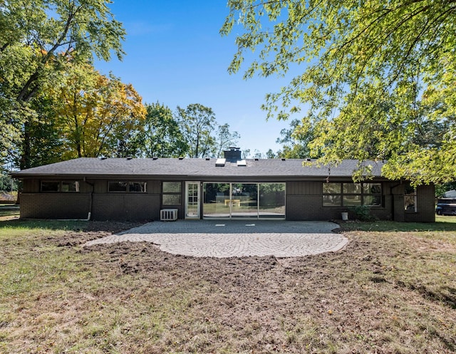 back of house featuring a patio area