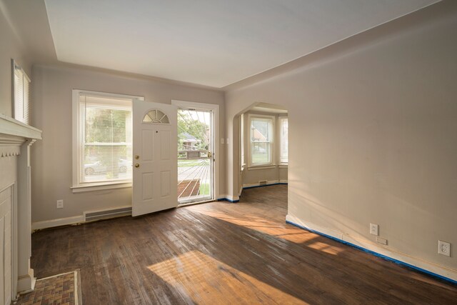 interior space with dark hardwood / wood-style floors