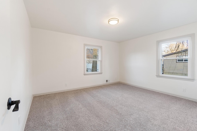 view of carpeted spare room