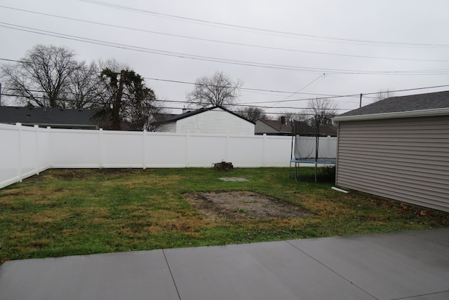 view of yard featuring a trampoline