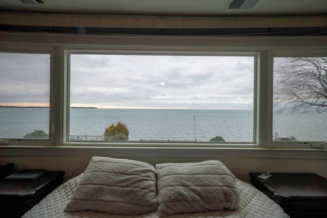 bedroom with a water view