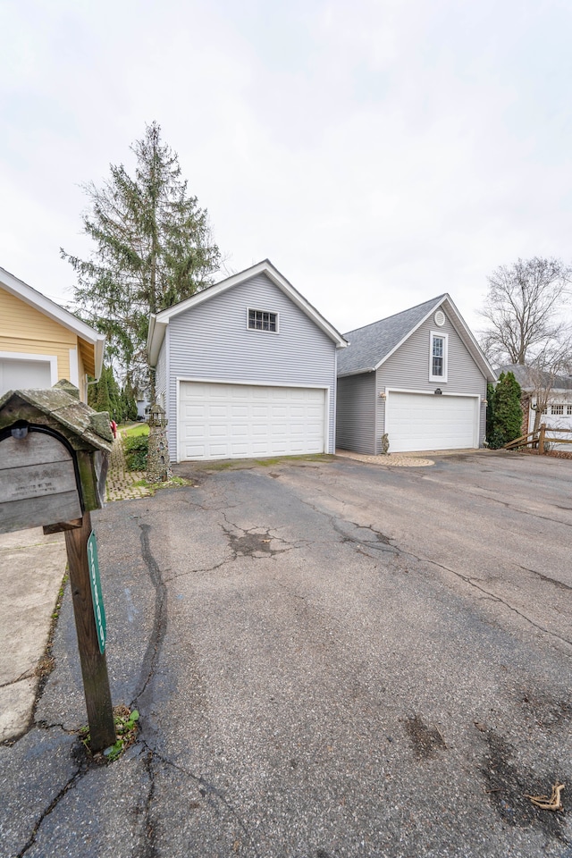 ranch-style home featuring a garage