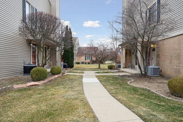 view of home's community featuring a lawn