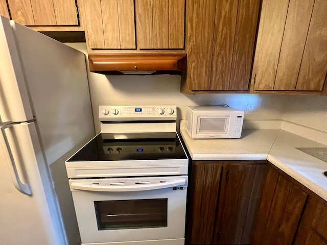 kitchen featuring white appliances