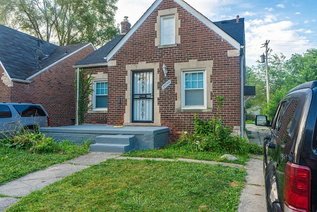 view of front of house with a front yard