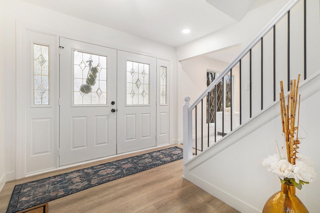 foyer with light hardwood / wood-style flooring