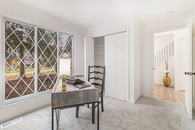 view of carpeted home office