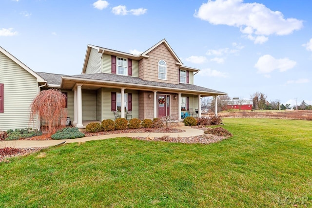 farmhouse inspired home with covered porch and a front lawn