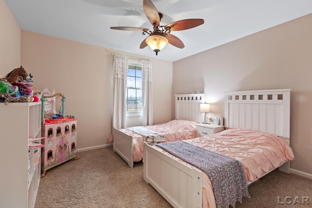 bedroom featuring ceiling fan and light carpet