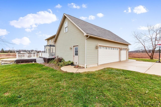 view of side of home featuring a lawn and a deck