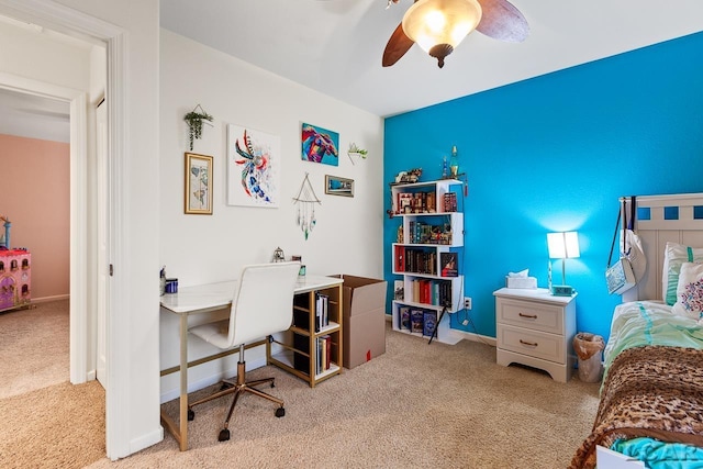 bedroom with ceiling fan and light carpet