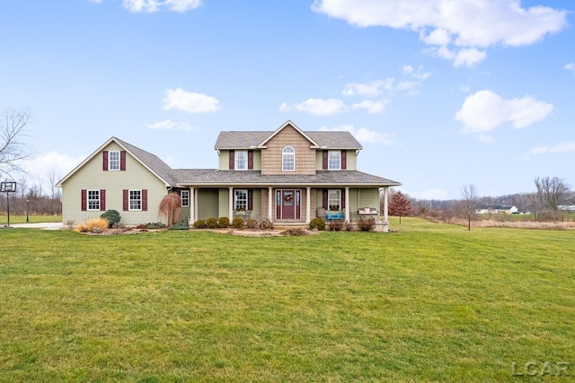 view of front of house with covered porch and a front lawn