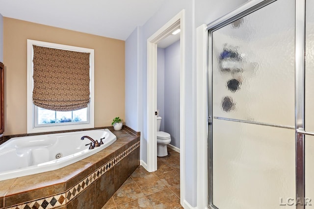 bathroom with tile patterned flooring, separate shower and tub, and toilet