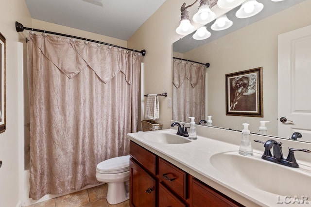 full bathroom featuring vanity, toilet, and shower / tub combo