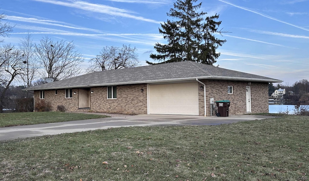 view of property exterior featuring a yard and a garage