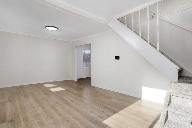 unfurnished living room featuring light hardwood / wood-style floors