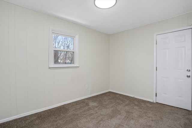 empty room featuring carpet flooring