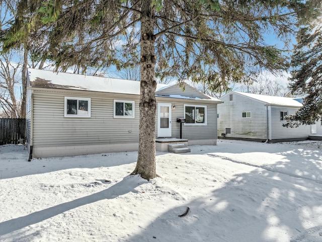 view of snow covered house