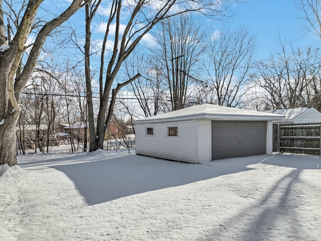 view of snow covered garage