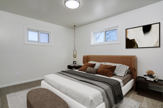 bedroom with light colored carpet