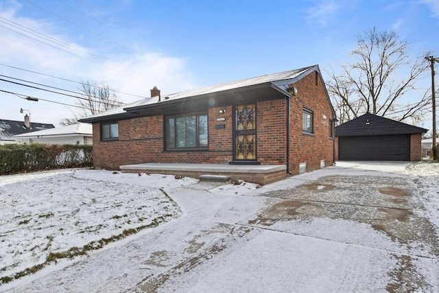 view of front facade with a garage and an outdoor structure